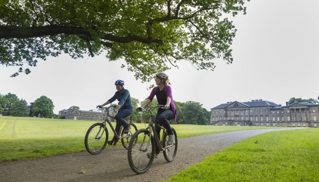 Nostell with people riding bikes