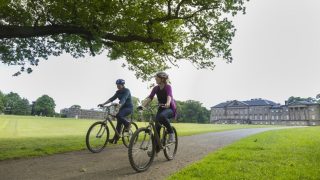 Nostell with people riding bikes